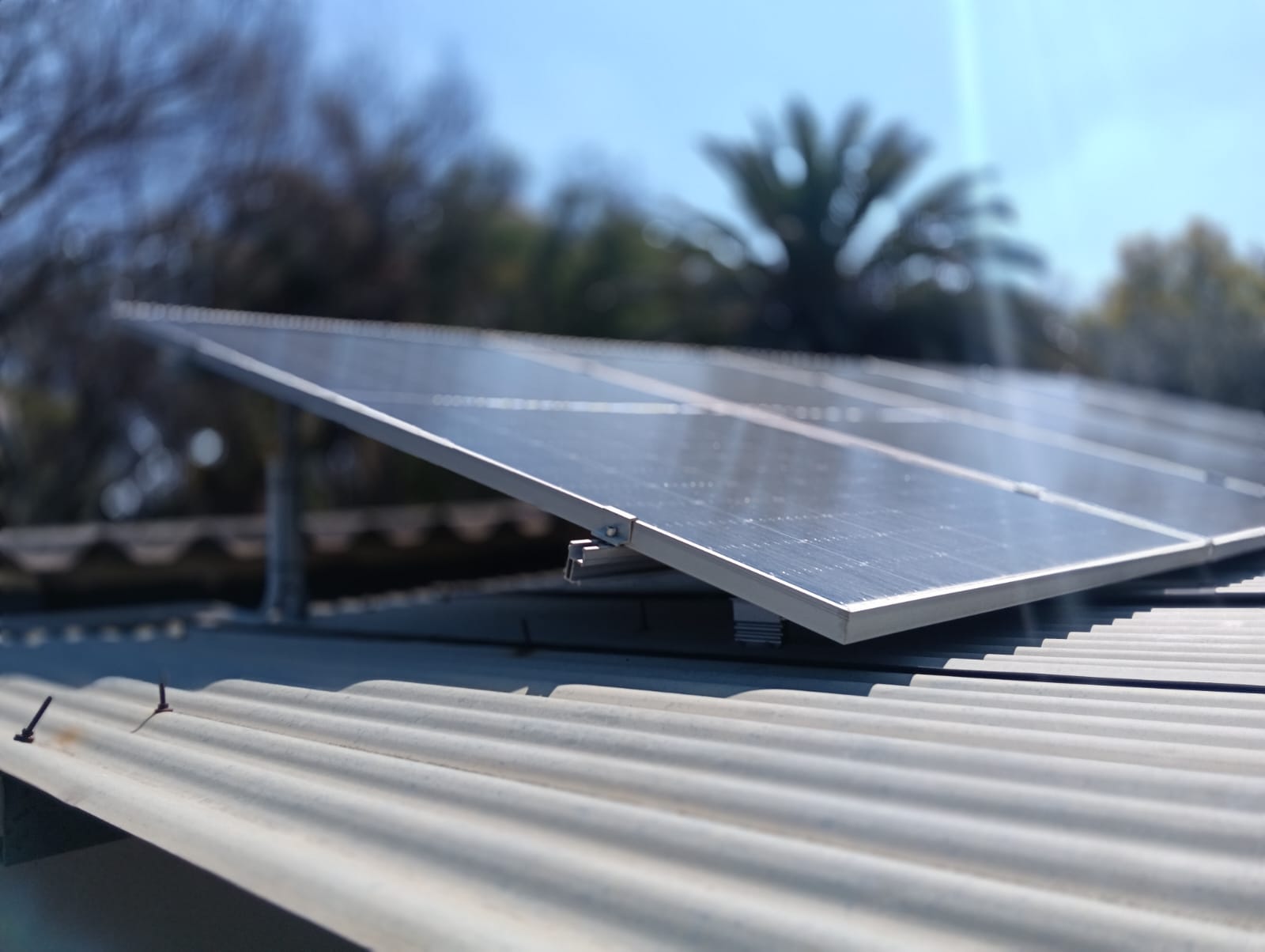 Close-up of solar panel mounting bracket on a roof