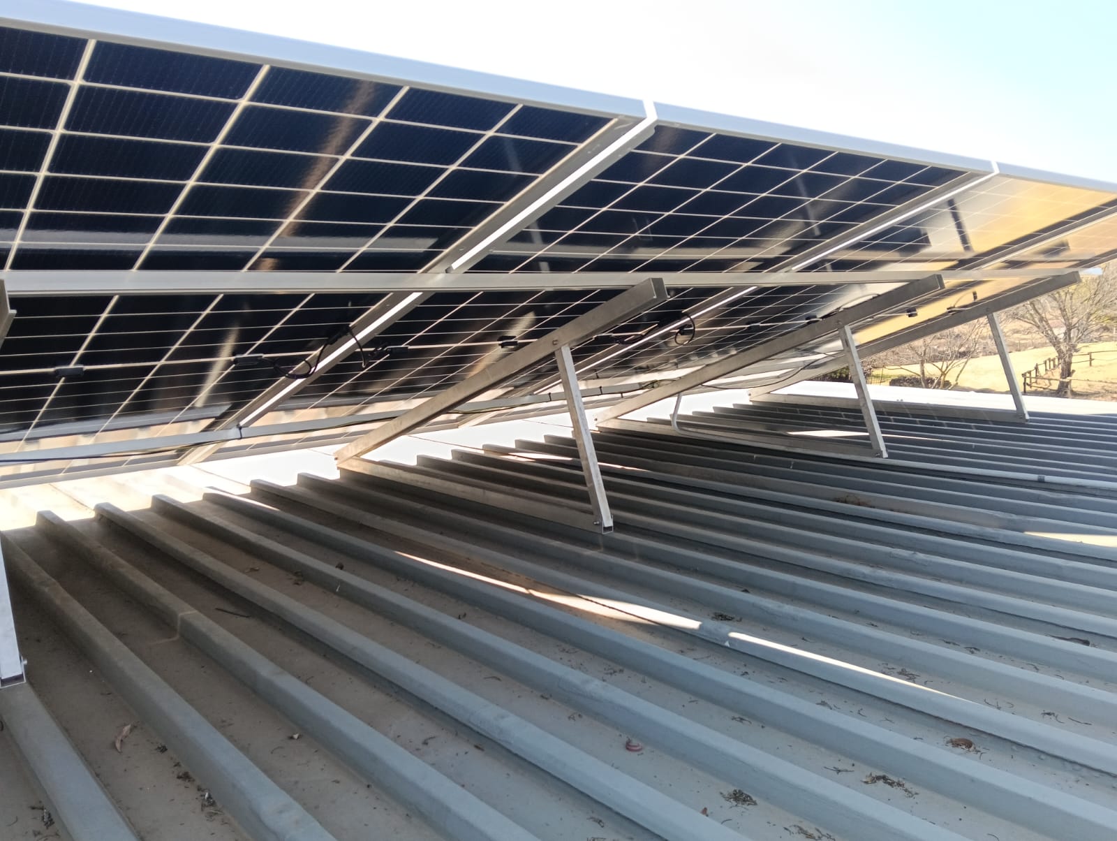 Underside view of solar panel mounting structure and wiring
