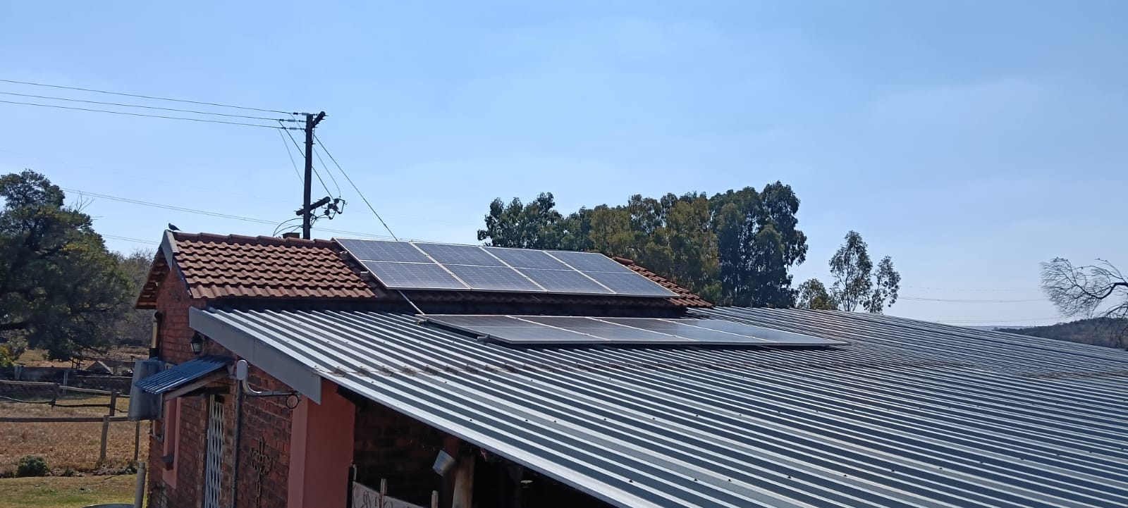 Solar panels fitted on a tiled roof dormer section